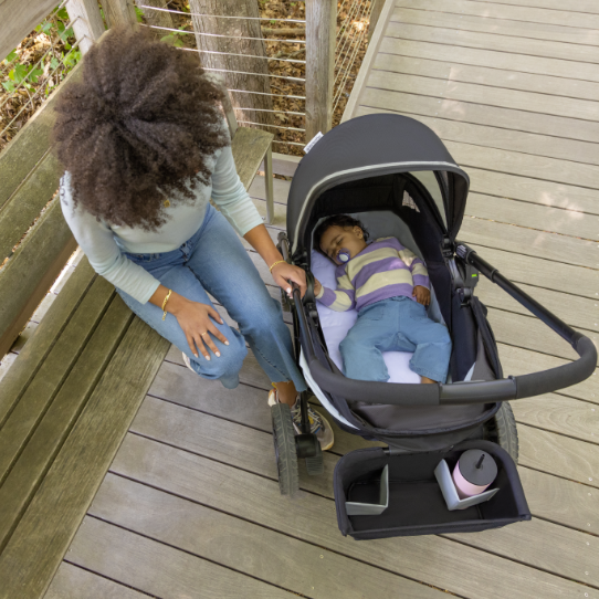 sleeping baby in a stroller